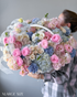 cotton-round-basket-pastel-flowers-pink-ranunculus-hydrangeas-baby-shower-flower-delivery-NYC