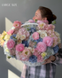 cotton-round-basket-pastel-flowers-pink-ranunculus-hydrangeas-baby-shower-flower-delivery-NYC