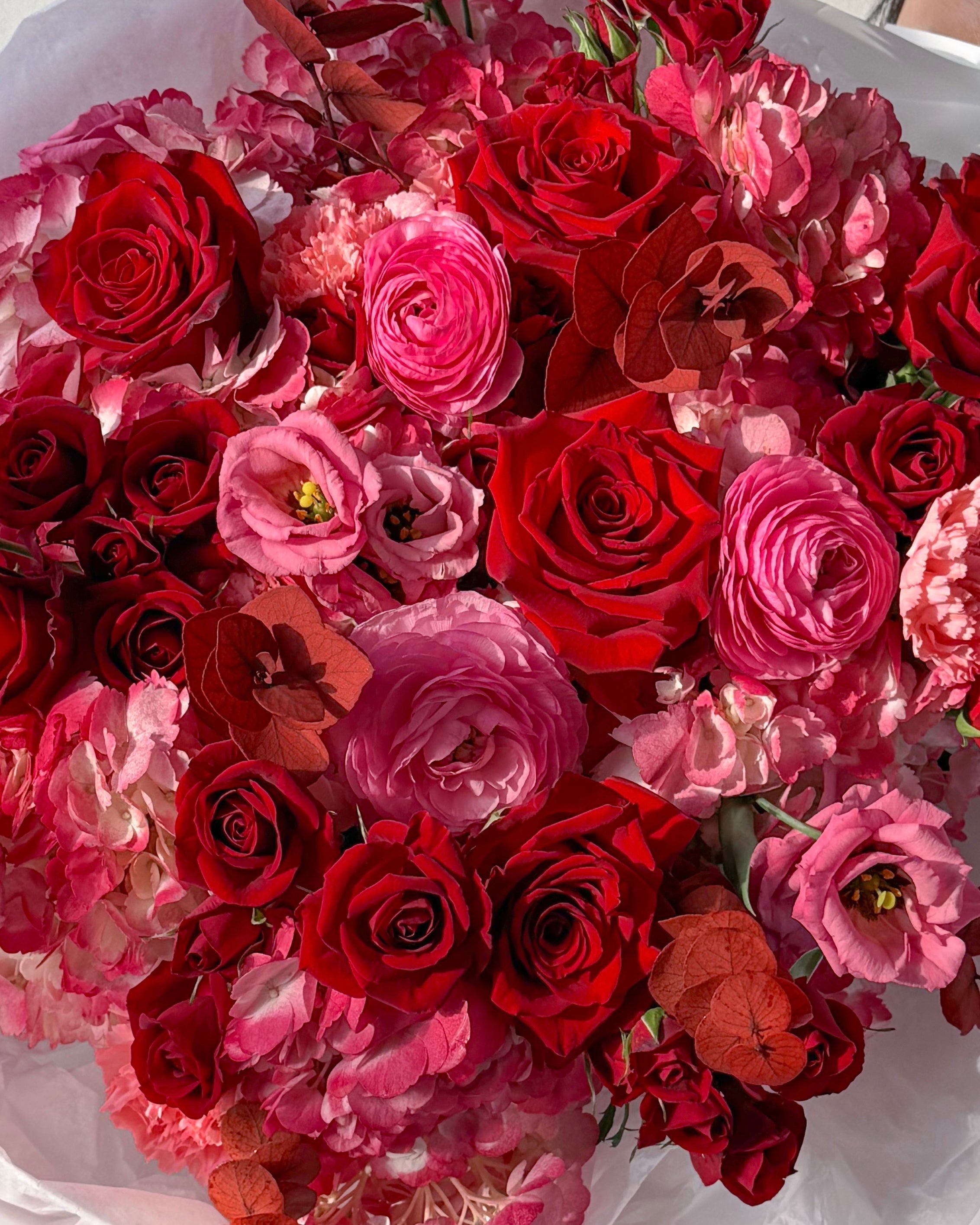 round-bouquet-ruby-red-roses-blush-spray-roses-pink-chrysanthemums-berries-nyc-flower-delivery