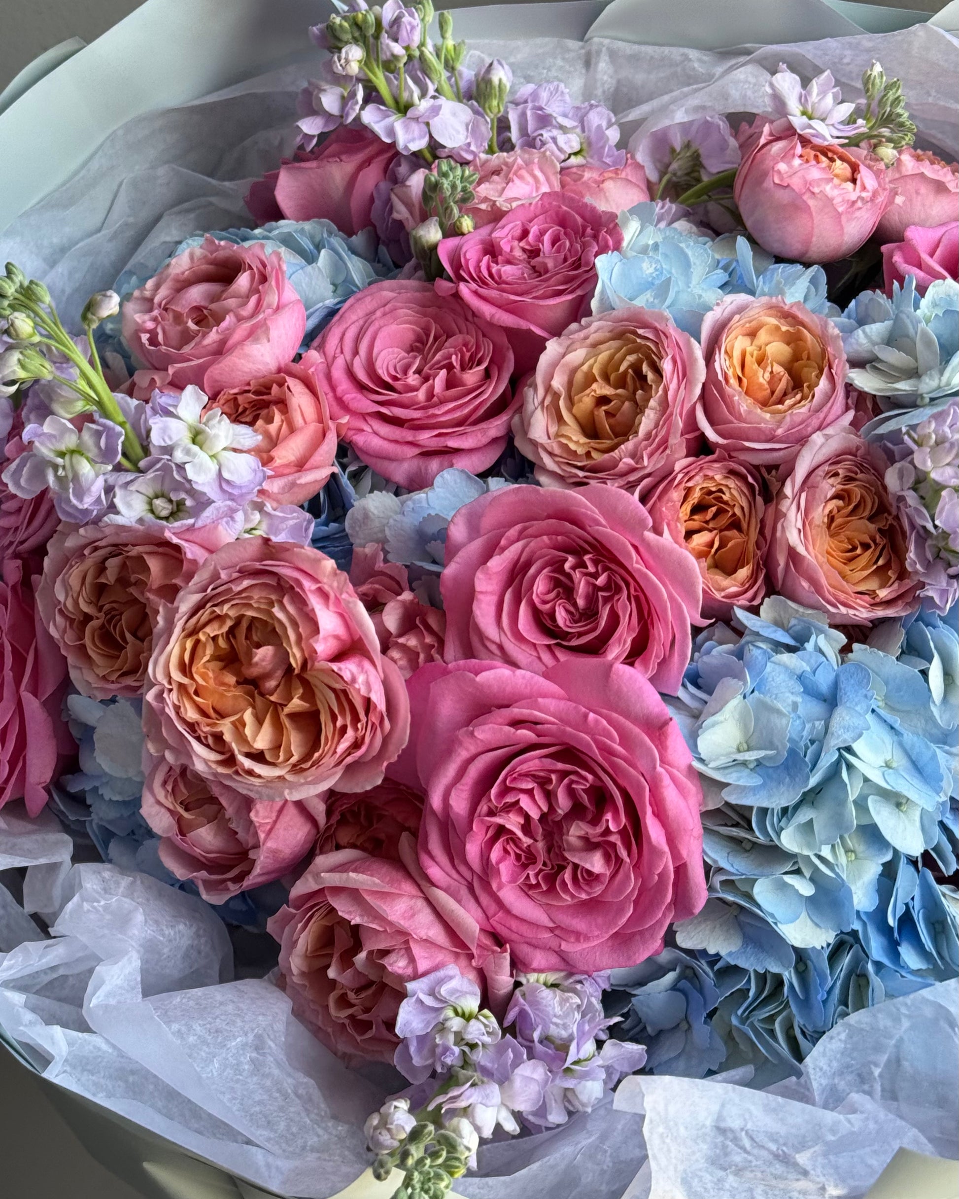 round-bouquet-aurora-designer-mix-fuchsia-coral-blue-flowers-all-me-flowers-brooklyn-nyc