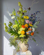 festival-colorful-flower-vase-arrangement-orange-yellow-green-blue-flowers-textural-design-palette-bouquets-NYC-florist