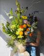 festival-colorful-flower-vase-arrangement-orange-yellow-green-blue-flowers-textural-design-palette-bouquets-NYC-florist
