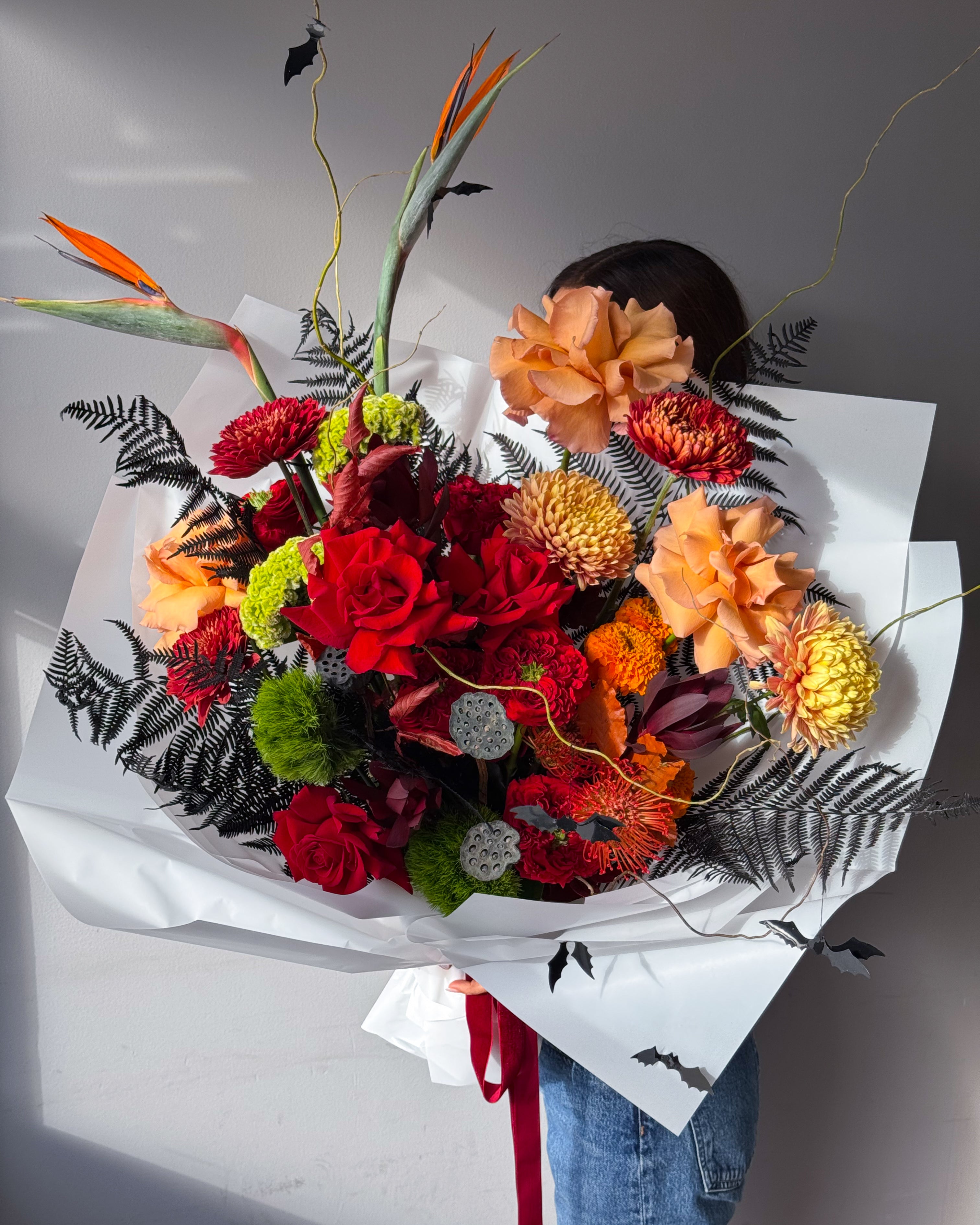 flow-bouquet-inferno-red-orange-roses-chrysanthemums-birds-of-paradise-halloween-all-me-flowers-nyc