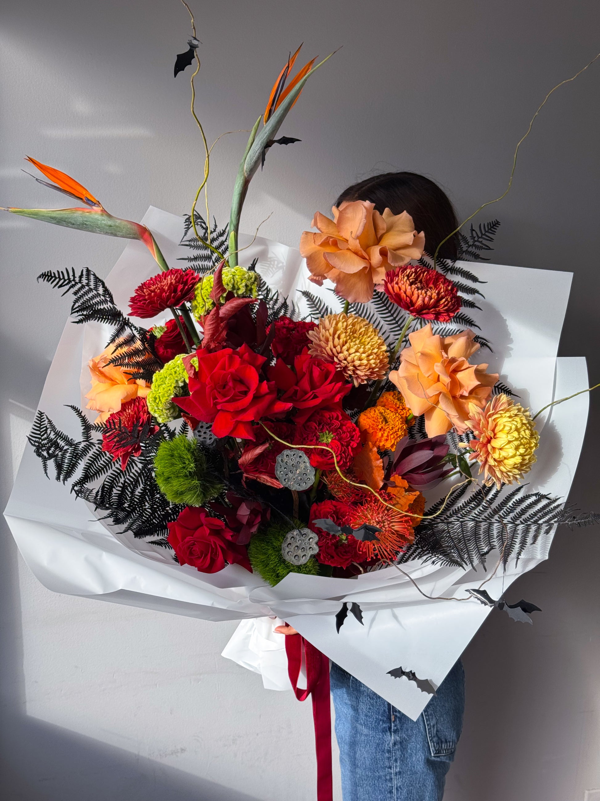 flow-bouquet-inferno-red-orange-roses-chrysanthemums-birds-of-paradise-halloween-all-me-flowers-nyc