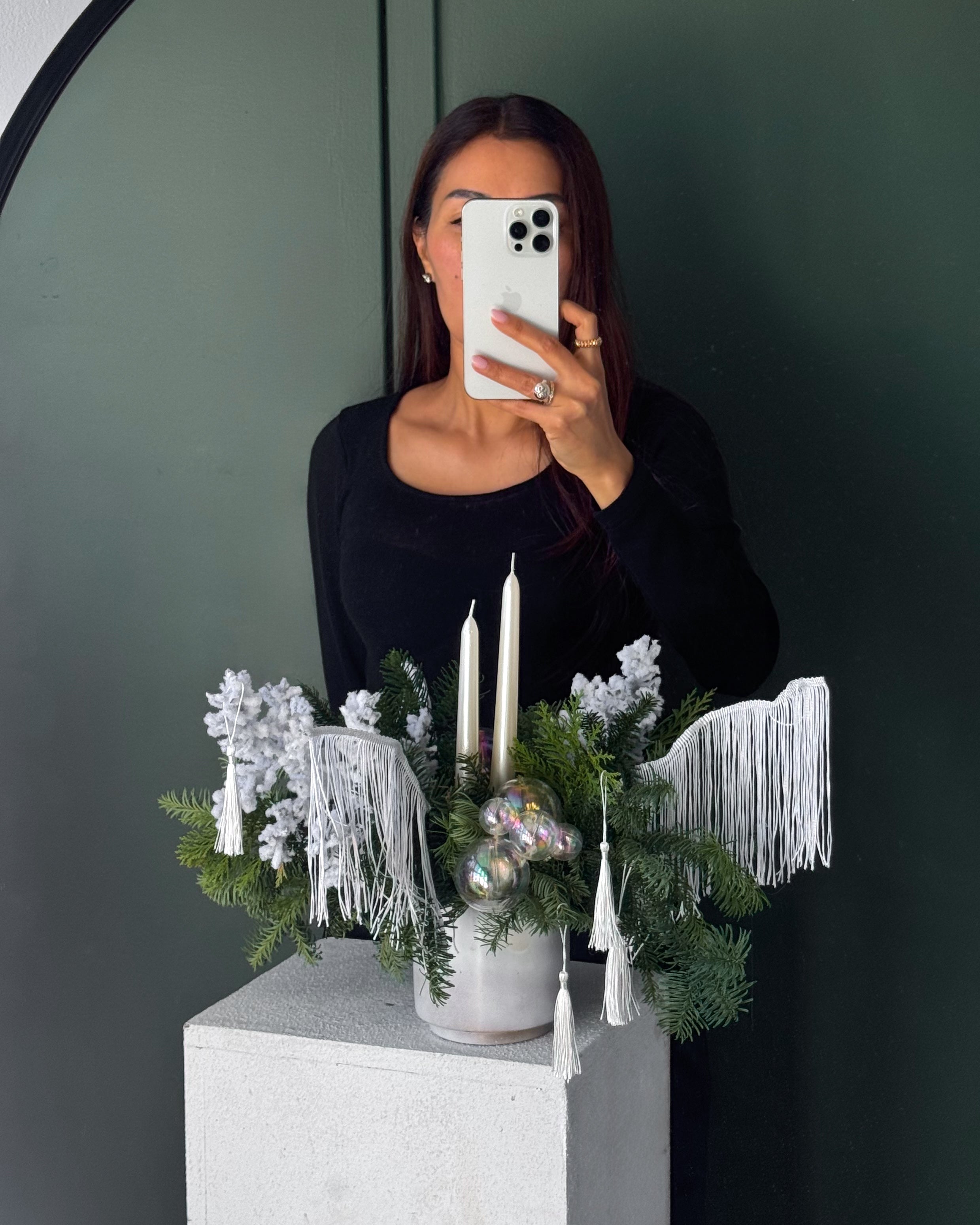 candle-arrangement-snow-queen-winter-evergreens-snowy-branches-white-fringe-two-candles-all-me-flowers-nyc