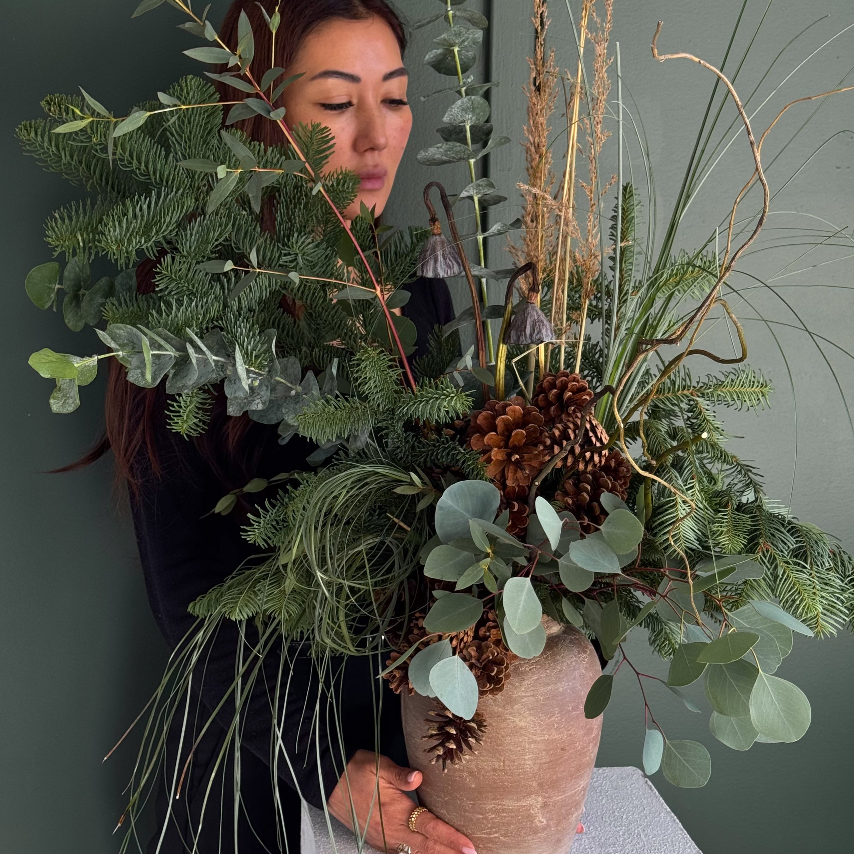 vase-arrangement-winter-forest-fir-eucalyptus-pinecones-rustic-winter-greenery-all-me-flowers-nyc