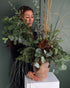 vase-arrangement-winter-forest-fir-eucalyptus-pinecones-rustic-winter-greenery-all-me-flowers-nyc