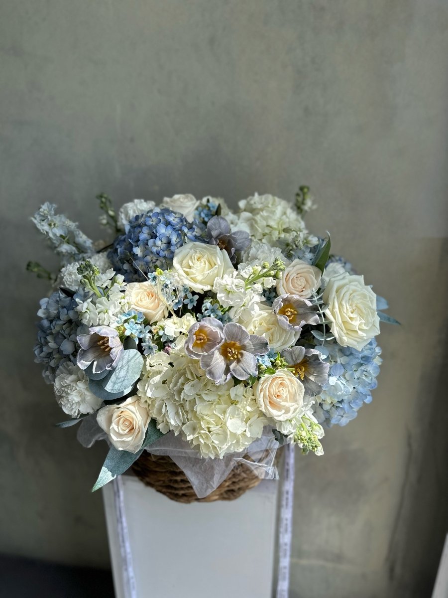 Basket “Baby Blue” - hydrangeas, roses, stock, seasonal flowers - All Me Flowers