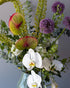 Vase arrangement “Cloud Nine” - orchids, anthuriums, seasonal flowers, vase included - All Me Flowers